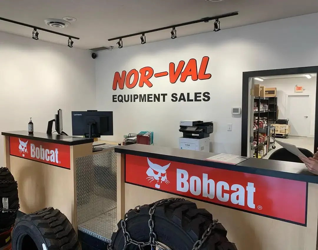 Custom wall logo installed in a Vernon business interior